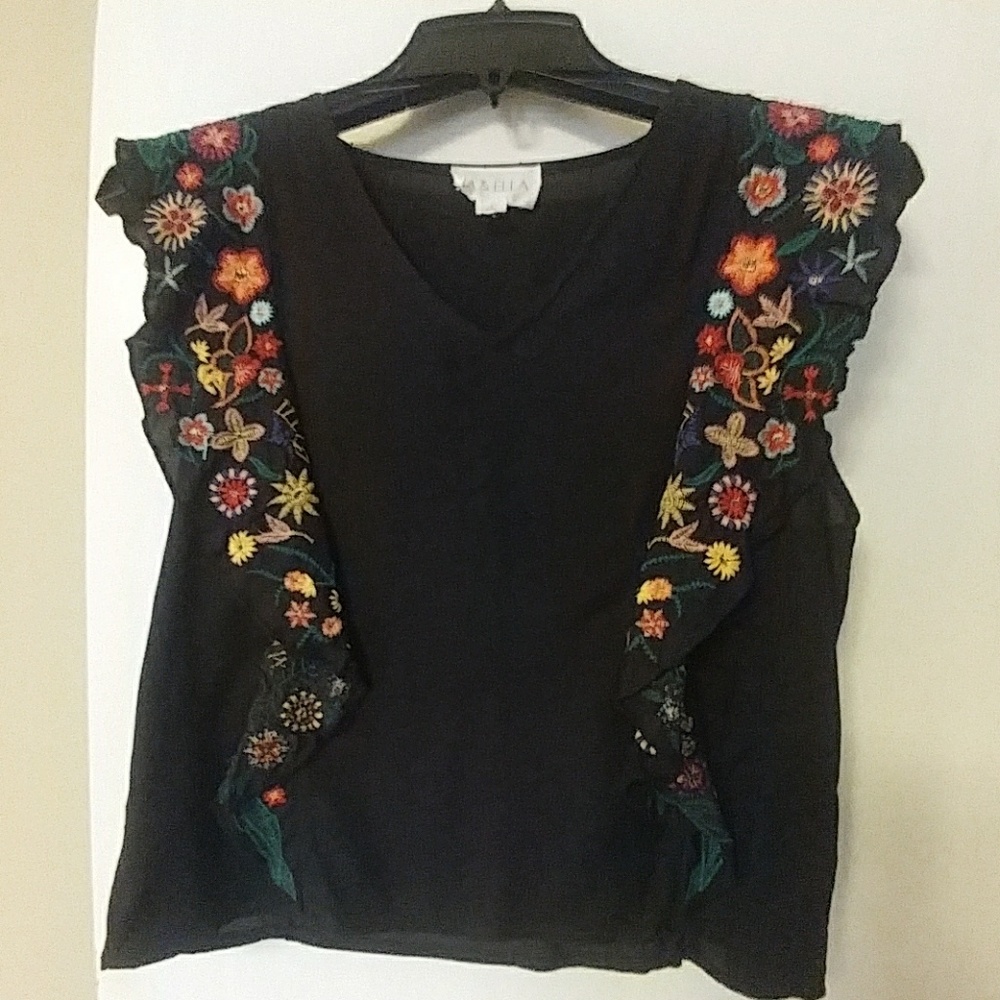 Embroidered top with ruffles